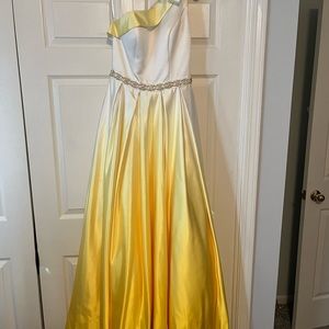 Worn once for a pageant, yellow ambre, size 4